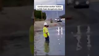 Construction worker makes puddle look deceptively deep [upl. by Sadnac]