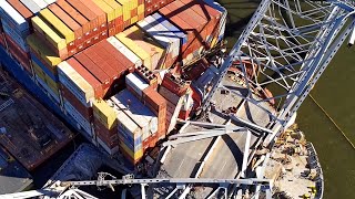 Salvage crews begin to remove containers from ship that crashed in Baltimore bridge  SWNS [upl. by Sumer]