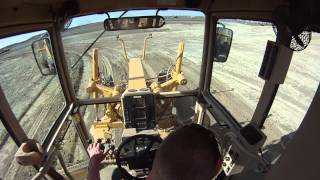 Cat 14H in cab view grading a haul road [upl. by Sikko255]