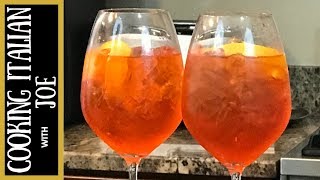 Aperol Spritz Italian Cocktail  Cooking Italian with Joe [upl. by Reinnej27]