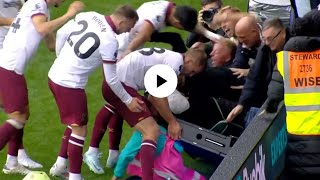 West Ham stars rescue ball boy after celebrating fans fall through advertising boards  Fall Moment [upl. by Ladin680]