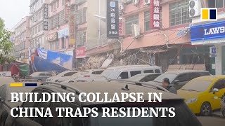 Multiple residents trapped after building collapses in central China’s Changsha [upl. by Hgielah235]