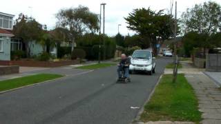 Mobility Scooter tows Smart Car to petrol station [upl. by Jereld]