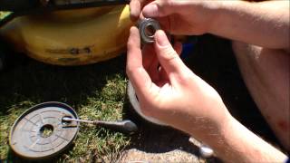 Lawnmower throwing a wheel replacing bearings  062 [upl. by Riba121]