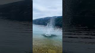 Big splash on the water  Water splashing rocks in slow motion  4K [upl. by Assyram441]