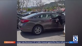 Terrifying video shows carjackers destructive rampage at a Southern California parking lot [upl. by Yllas]