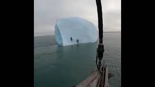 ICEBERG FLIPS WHILE PEOPLE STANDING ON IT [upl. by Amak]