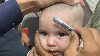 Most beautiful baby girl head shaved by Indian barber 💈 [upl. by Noirod]