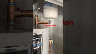 Installing a New Expansion Tank for a Water Heater diy plumbing construction plumber [upl. by Elrebma]