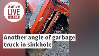 A garbage truck collapses into a sinkhole in Cape Town [upl. by Goer765]