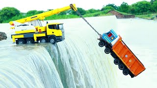 New Tata Dumper Truck Accident Big Dam River Pulling Out Mahindra Tractor Crane  Tipper Truck CSToy [upl. by Ynnohj146]