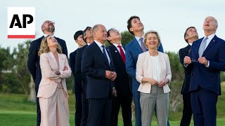 G7 leaders mingle with each other watch parachute display at Italy summit [upl. by Gniy]