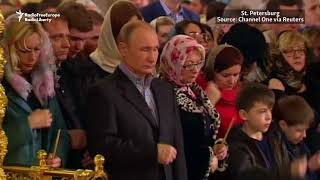 Putin Medvedev Attend Orthodox Christmas Services [upl. by Ebbarta322]