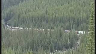 Spiral Tunnels in the Rocky Mountains with a Canadian Pacific CP Train near Field [upl. by Issi634]