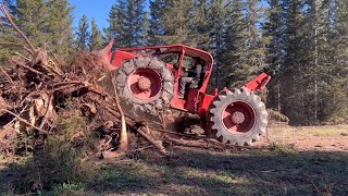 1960s Timberjack skidder making trails and pushing tree stumps [upl. by Lemuela]