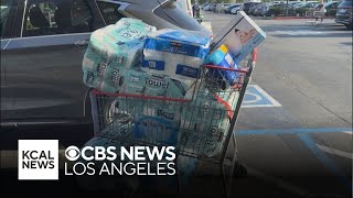 Shoppers stuff shopping carts with toilet paper and towels even after dockworkers strike deal [upl. by Akihdar815]