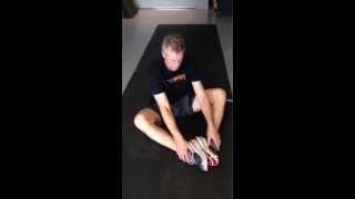 How to Stretch Groin with Band Assistance  PC360 [upl. by Rollo]