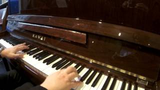 Piano droit doccasion Kawai KX21 acajou [upl. by Noreik]