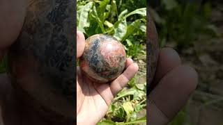 Polished rhodonite sphere afghanistan afghanite quartz afghanjewelry crystals gems gemstones [upl. by Rosemarie]