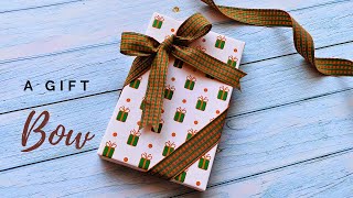 How to tie diagonal Ribbon Bow on Gift Box  Christmas Ribbon Gift wrap easy giftwrap [upl. by Aivonas71]