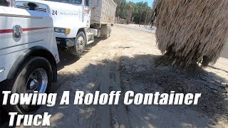 Towing A Loaded Rolloff Truck [upl. by Igig]