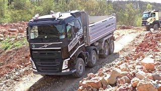 Volvo offroad trucks in quarry [upl. by Killoran]