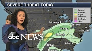 Meteorologist wears her toddler while reporting weather forecast [upl. by Anair]