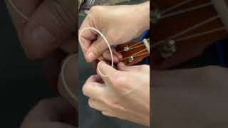 How to string a ukulele using the lock in method ukulele restringtutorial ukulelerestring [upl. by Haianeb29]