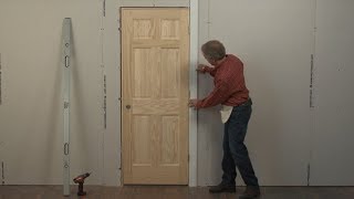 Beginners Learn how to Install a Door in 4 Minutes without Shimming [upl. by Nnaerb994]