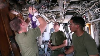 Marine Corps Avionic Technicians Working On CH53E Super Stallion Helicopter [upl. by Ardnosal815]