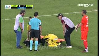 Greek stretcher bearers drop injured player while taking him off pitch [upl. by Locklin]