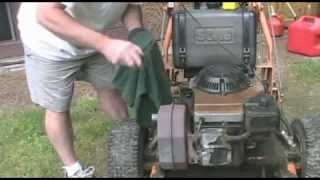 Lawn Mower Checking Oil Level and Cleaning Mower Deck [upl. by Assilem]