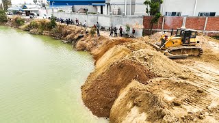 Komatsu Bulldozer Pushing Soil Filling Into Water With 25T Dump Trucks [upl. by Imaon]