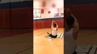 Dallas Moore hits 3 while sitting down during stretches before practice [upl. by Nelleyram]