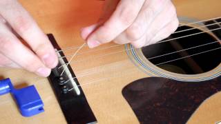 How to Change an Acoustic Guitar String EASY [upl. by Sorce]