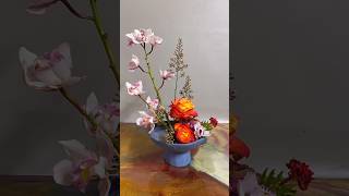 A Floral Design Tutorial with Orange Roses and Pink Orchids [upl. by Oirretna957]