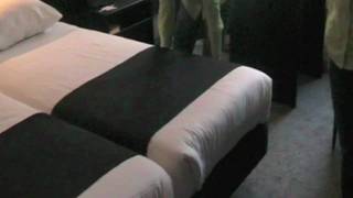 Rooms division instructional video How to make a bed [upl. by Thatcher750]