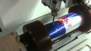 Gravograph M40 engraving a Red Bull Energy drink Aluminum can [upl. by Dulcinea]