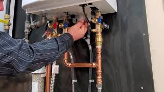 Basic Maintenance of a Navien NPE A tankless water heater [upl. by Tien]