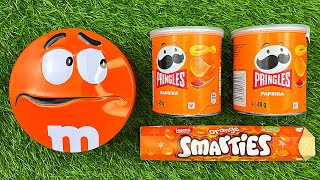 Satisfying Video  Unpacking 1 Orange Containers MampM’s vs 2 Pringles Boxes [upl. by Maddox]