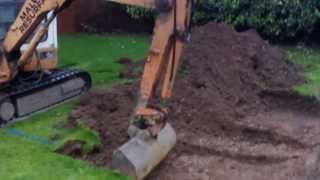 Atlas 404 Mini Digger Excavating A Lawn [upl. by Volotta]