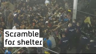 Refugee crisis food thrown at migrants in Hungary [upl. by Enneibaf]