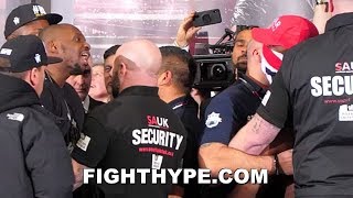 WHOA DEREK CHISORA AND DILLIAN WHYTE ERUPT HEATED EXCHANGE AS BOTH RESTRAINED DURING FACE OFF [upl. by Gerick]