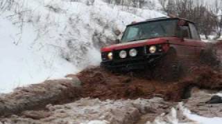 Shortened Range Rover through deep frozen water [upl. by Berni943]