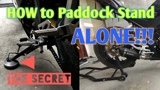 How to Paddock Stand your Motorcycle  Putting and Removing the bike in Paddock [upl. by Nalhsa513]