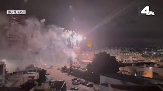 Illegal fireworks show glows over downtown LA [upl. by Athalla636]