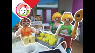 Playmobil en français Cuisiner des Biscuits de Noel  La famille Hauser  film pour enfants [upl. by Ciapas]