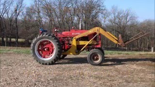 1953 Farmall Super M Tractor w Davis Loader amp Hydraulic Bucket [upl. by Rollecnahc]