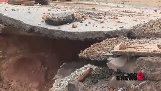 Raw Video Road Crews Repair Sinkhole In WinstonSalem [upl. by Annaeerb]