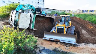 Incredible Overloaded Dump Truck Failed to Drive Up Hill Help By KOBELCO SK210LC Excavator amp Truck [upl. by Anilejna]